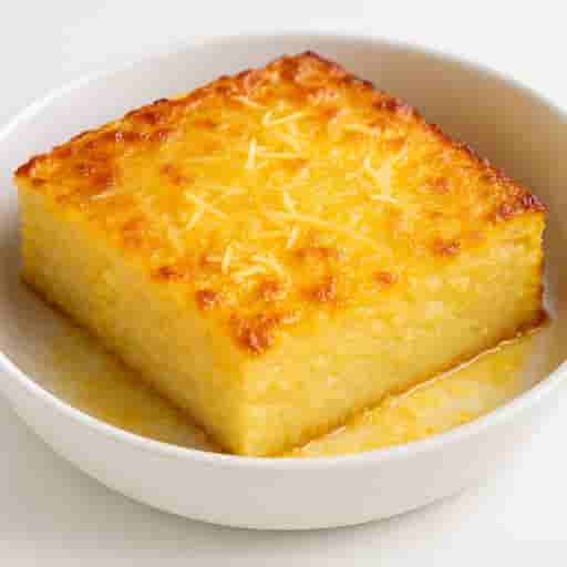 Creamy Filipino Cassava Cake with Cheesy Topping